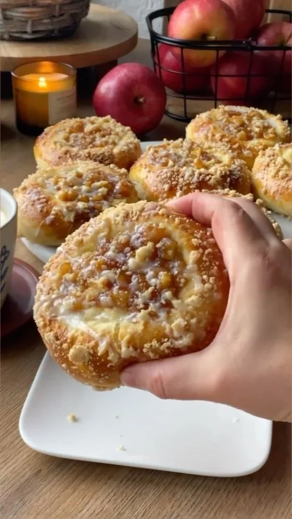 Apple cheesecake buns with a crumble topping and sweet glaze