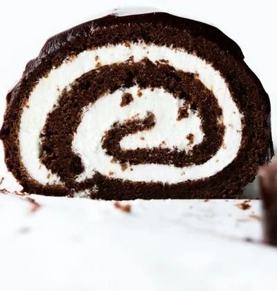 Delicious Chocolate Swiss Roll Cake with creamy filling