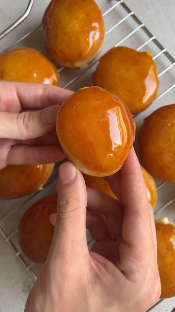 Delicious Crème Brûlée Doughnuts with a caramelized top and creamy filling