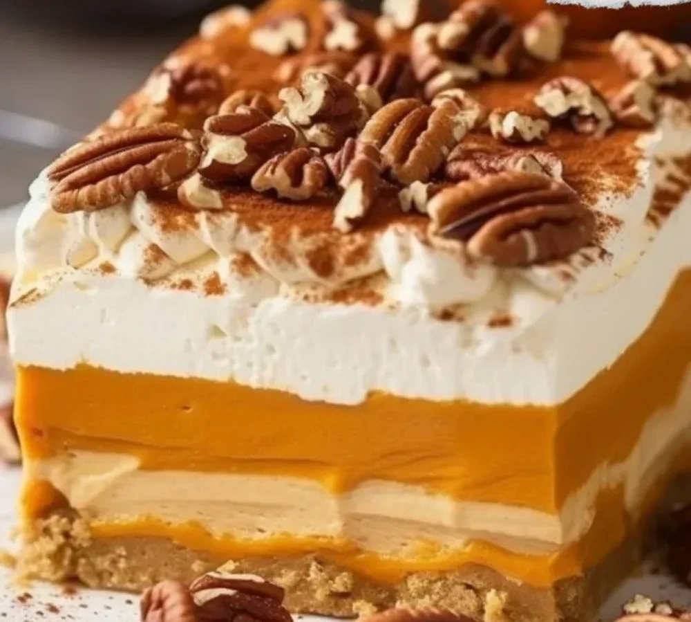 Delicious Pumpkin Lush dessert with creamy layers and pumpkin spice topping.