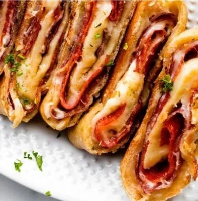Delicious Stromboli filled with meats and cheeses, showcasing a savory Italian dish.