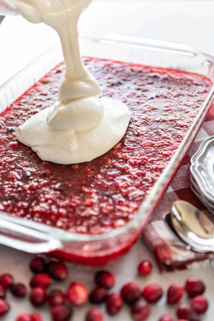 Delicious Cranberry Jello Salad with vibrant red berries and creamy layers