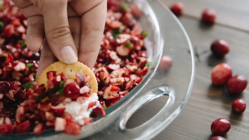 Holiday Cranberry Jalapeño Dip served in a festive bowl