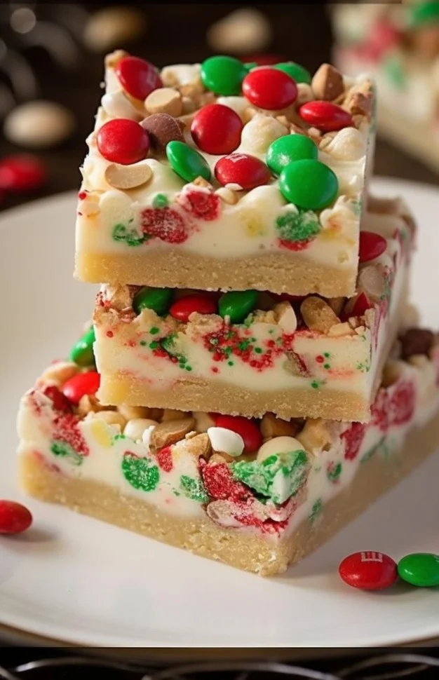 Santa's no-bake sugar cookie bars decorated with festive sprinkles