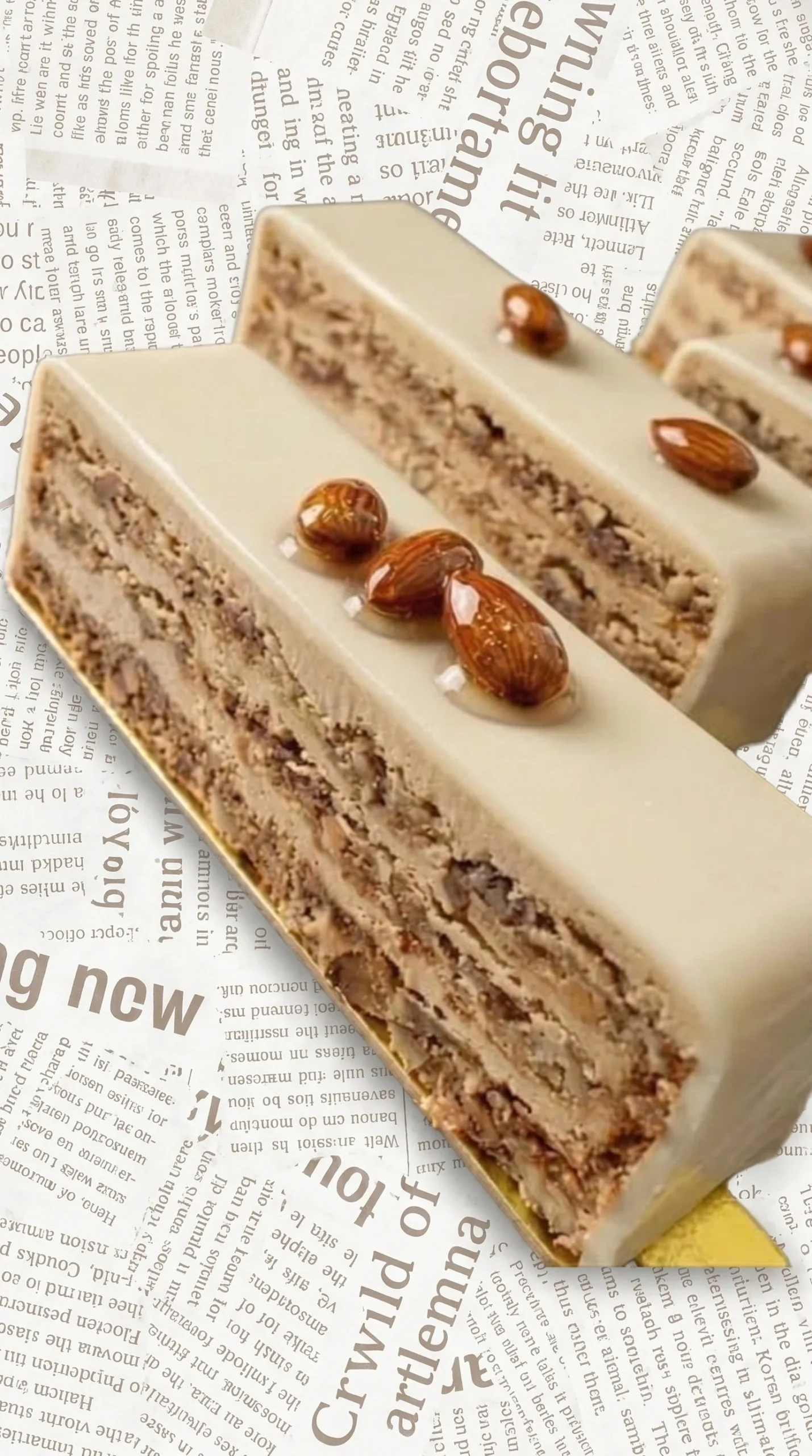 Delicious almond and coffee cream dessert topped with slivers of almonds.