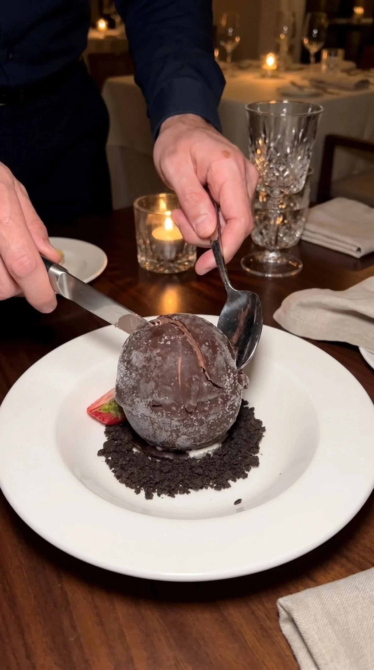 A delicious Chocolate Shell Tartufo dessert showcasing a rich chocolate exterior.