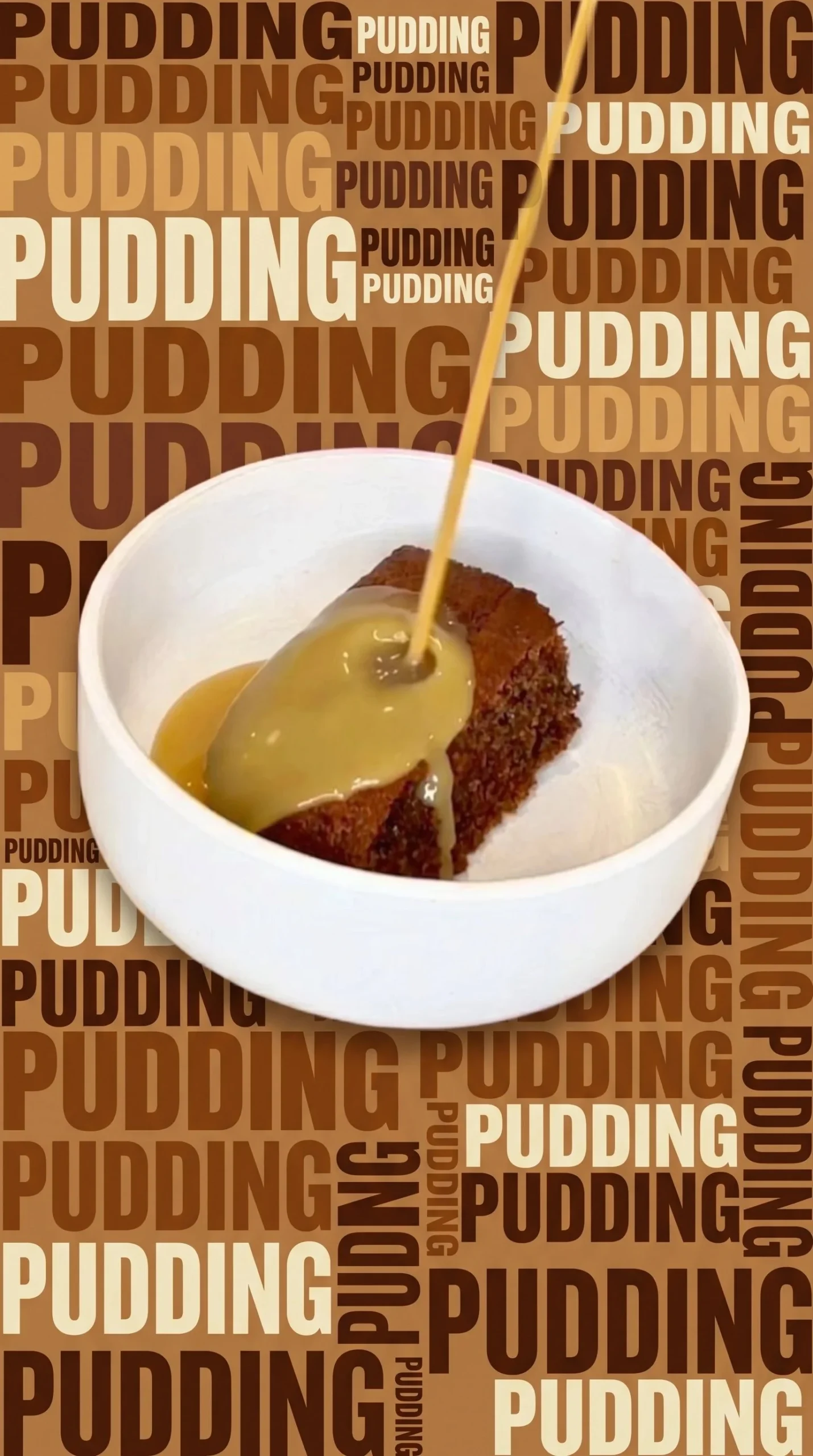 Delicious sticky date pudding served with creamy sauce and garnished