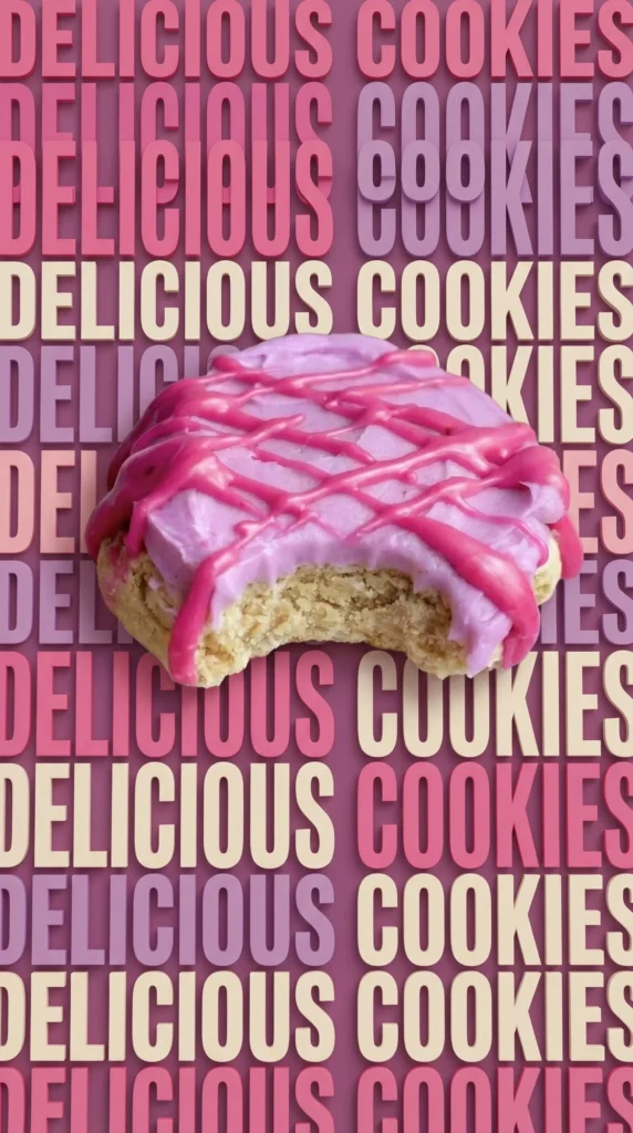 Brown sugar cookies topped with blueberry cream cheese frosting on a plate.